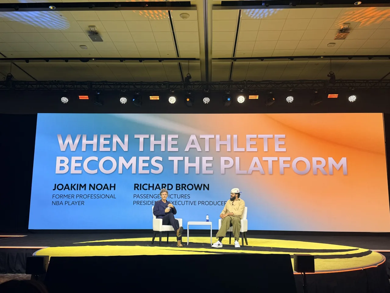 From left: Richard Brown of Passenger Pictures and Joakim Noah during “When the Athlete Becomes the Platform” at Jupiter Festival Miami.